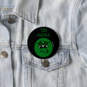 BADGE ROND 7,6 CM SUCKS...TBI (En situation)