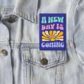 Badge Un nouveau jour arrive (Insitu)