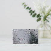 Baisses de pluie sur la carte en verre de profil (Debout devant)