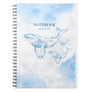 Baleines joueuses sur le carnet océanique