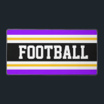 BALLE DE FOOTBALL Bright PurpleBlack Yellow Stripe<br><div class="desc">Ce design sportif coloré et audacieux présente du texte de FOOTBALL athlétique à l'intérieur d'une large bande noire centrale,  associée à des rayures violettes jaune doré,  blanches et violettes vives et vives. Les couleurs et le texte de ce design peuvent être personnalisés.</div>