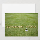 Balle de golf avec le texte Merci sur de l'herbe v (Devant / Derrière)