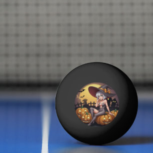 Balle De Ping Pong Sorcière d'Halloween aux Yeux Verts sur une Citrou