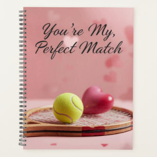 Balle de tennis avec cœur rouge