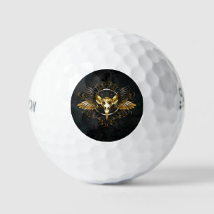 Balles De Golf Crâne d'oiseaux dorés sur arrière - plan noir