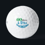 Balles De Golf Funny Golf Balls 60e anniversaire<br><div class="desc">Célébrez le 60e anniversaire d'un golfeur en style avec Funny Golf Balls 60e édition anniversaire. Ces balles de golf font un cadeau amusant et unique pour tout passionné de golf qui atteint cet âge marquant. Avec l'inscription ludique "60 ans et toujours en mouvement !" ces boules ajoutent une touche d'humour...</div>