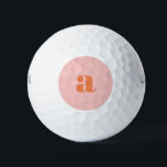 Balles De Golf Joli Pastel rose orange Monogramme rétro Lettres<br><div class="desc">Ces boules de golf élégantes présentent votre monogramme en corail sur un arrière - plan rose pastel en lettrage rétro. Super idée cadeau !</div>