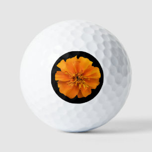 Balles De Golf Marigold orange sur Arrière - plan noir