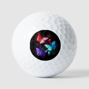 Balles De Golf Trois papillons lumineux sur fond de nuit