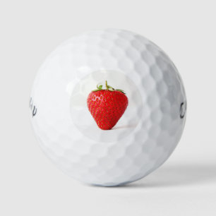 Balles De Golf Un cwb de fraise rouge