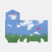 Ballotins balle de golf dans l'herbe (Déplié)