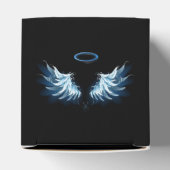 Ballotins Blue Glowing Angel Wings on black background (Haut)