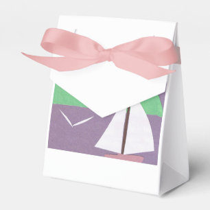 Ballotins Ce sac cadeau est conçu avec un voilier blanc