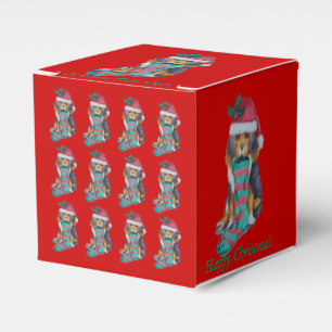 Ballotins chiot noir et brun mignon avec le bas de Noël