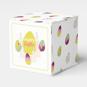 Ballotins Des lapins de Pâques avec des oeufs. boîte cadeau.