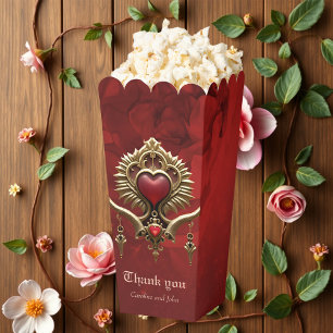 Ballotins Élégance en lustre rouge avec un coeur orné.