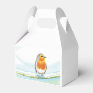 Ballotins Red Robin sur branche enneigée en Ballotin d'hiver