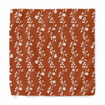 Motif élégant de vigne florale blanche sur orange