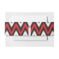 un motif en zigzag rouge et noir sur fond blanc