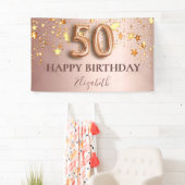 Banderoles 50e anniversaire rose or étoiles script ballon ros (En situation)