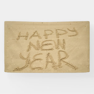 Banderoles Bonne année dans le sable