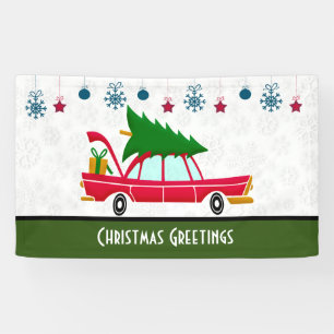 Banderoles Voiture rouge rétro portant un arbre de Noël