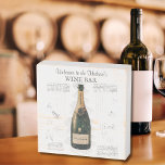 Bar à vin de famille vintage bouteille<br><div class="desc">Cette enseigne est l'ajout parfait à tout bar à vin familial. La bouteille de vin vintage graphique et le panneau en bois blanc en détresse en fait un bel accent pour toute maison de ferme, vintage ou de style champêtre. L'expression et le nom de famille sont personnalisables ce qui en...</div>