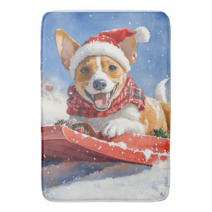 Basenji-hond in slee Laat het sneeuwen Kerstmis Badmat