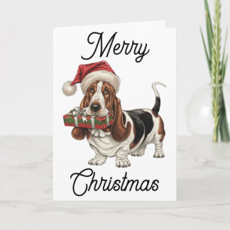 Basset Hound met Kerstman hoed cadeau in de bek Kaart