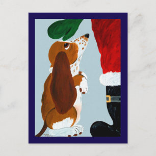 Basset Puppy krijgt een huisdier van de Kerstman Briefkaart