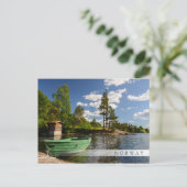 Bateau vert dans un fjord en Norvège carte postale (Debout devant)
