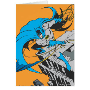 Batman Throws Batarang op Rooftop