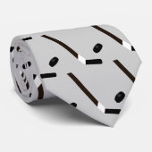 Bâton de hockey et cravate modelée par coutume de (Roulé)