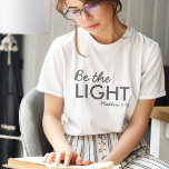 Be the Light | Matthew 5:14 Bible Verse Christian<br><div class="desc">Simples et élégantes écritures chrétiennes citent t-shirt d'art avec vers biblique "Be the Light - Matthew 5:14" dans la typographie minimaliste moderne en noir off. Ce design de foi moderne et tendance est le cadeau parfait et la marque de mode. | #christian #religion #écritures #foi #bible #jesus #bethelight</div>