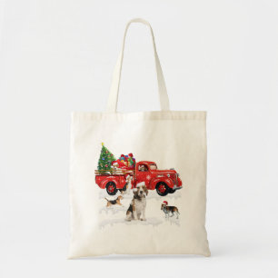 Beagle die met rode vrachtwagen rijdt tote bag