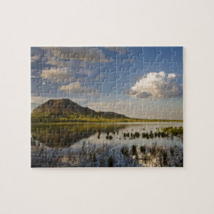 Bear Butte weerspiegelt in Bear Butte Lake nabij Legpuzzel