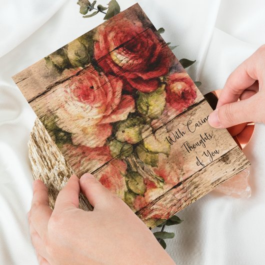 Beaux Roses sur la carte en bois