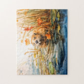 Beaver sitting by pond among reeds legpuzzel (Verticaal)