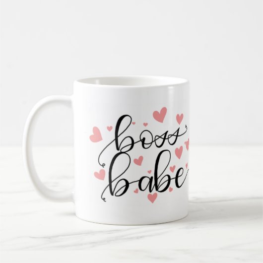 Bébé de patron avec la tasse de coeurs (Gauche)