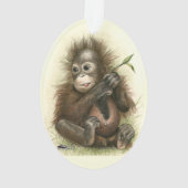 Bébé orang-outan avec des feuilles (dos)