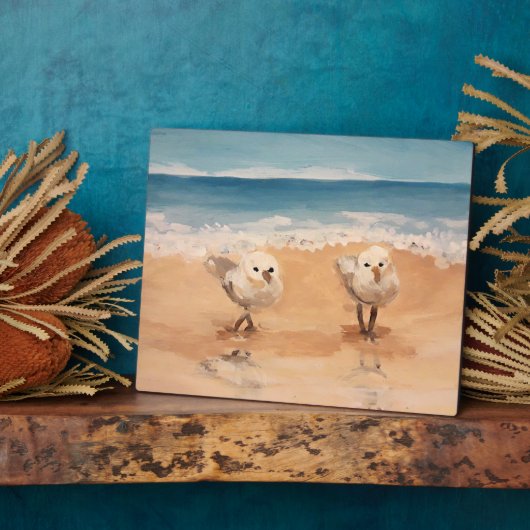 Bécasseaux de sable près de la Plaque Sea Shore (Côté)