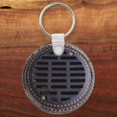 Bedekking van mangat en sleutelhanger van koolstee (Voorkant)