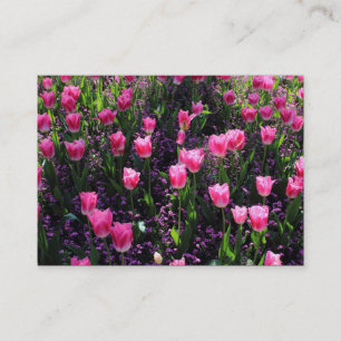 Bedje van roze tulpen visitekaartje