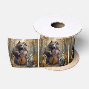 Beer die cello speelt in herfstbossen lint