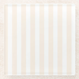Beige en witte snoepjes strepen glazen onderzetter