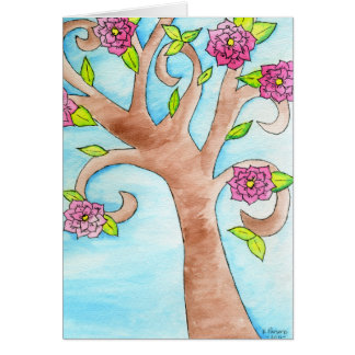 Bel arbre avec les fleurs roses