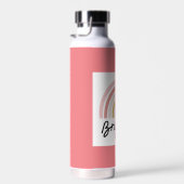 Belle Brigitte avec bouteille d'eau Rainbow. (Plage)