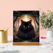 Belle chatte noire et fluide aux yeux dorés (Mariage)