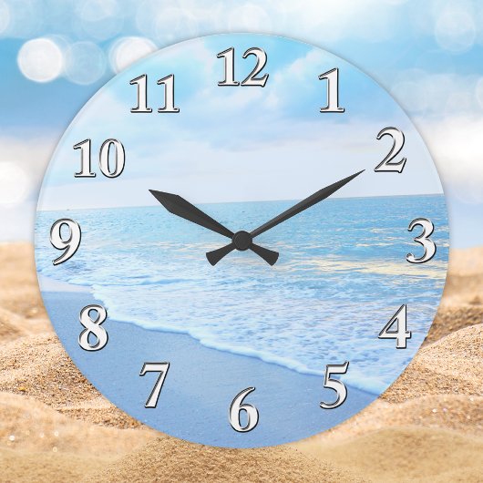 Belle horloge bleue et turquoise de la plage