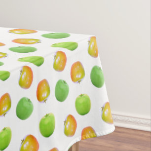 Belles pommes vertes sur nappe blanche